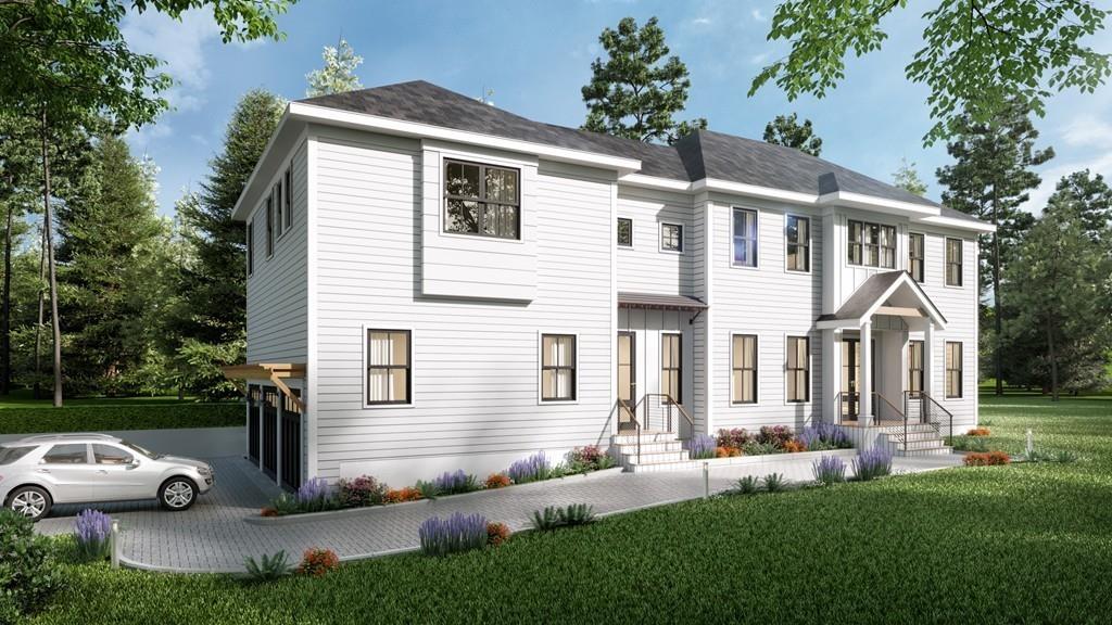 68 Freemont Street Lexington, MA 02421 - Photo 3 of 11 a front view of a house with a garden and yard