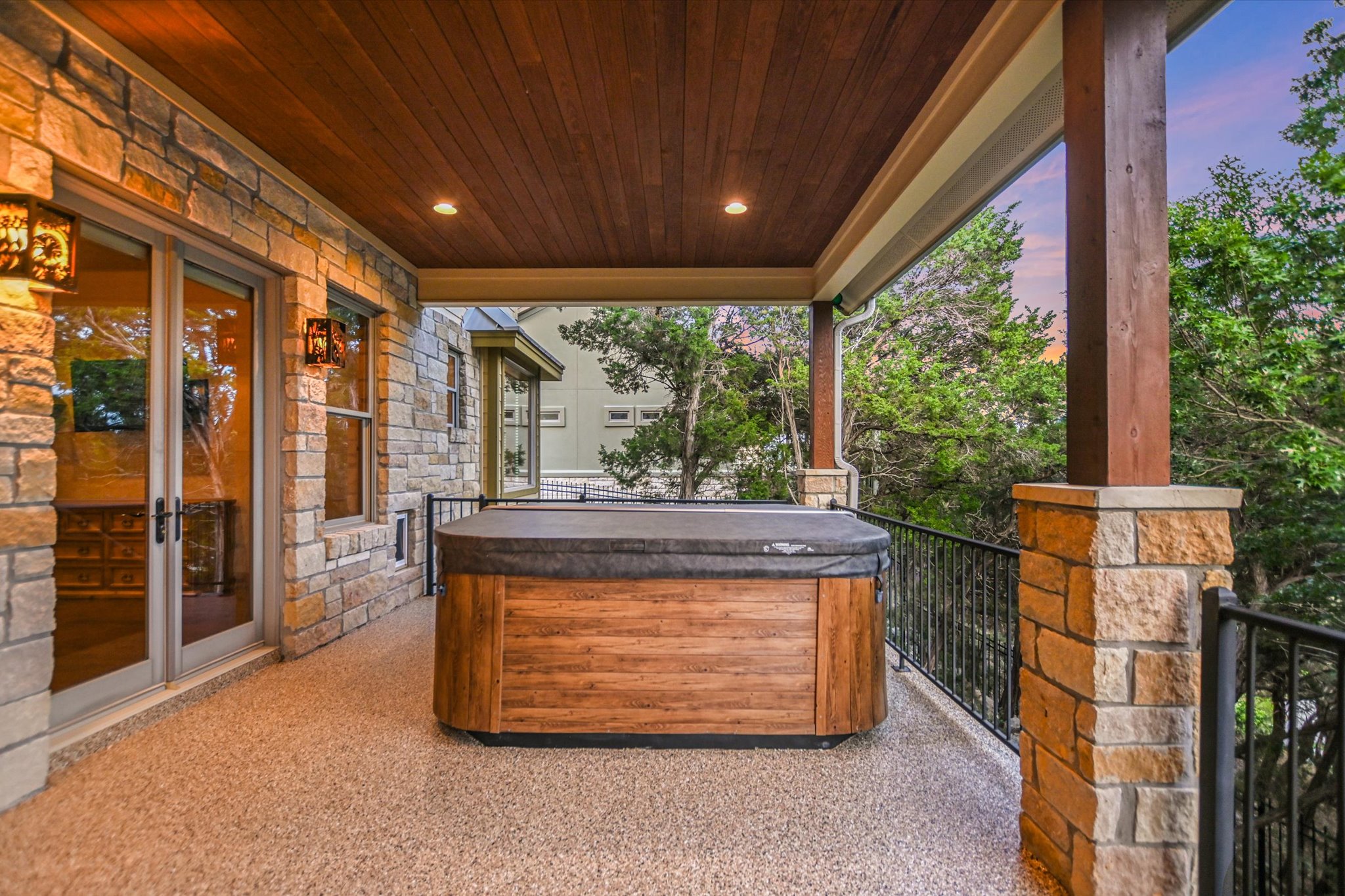 409 Venture Boulevard South Point Venture, TX 78645 - Photo 25 of 37 Covered outdoor terrace with a spa