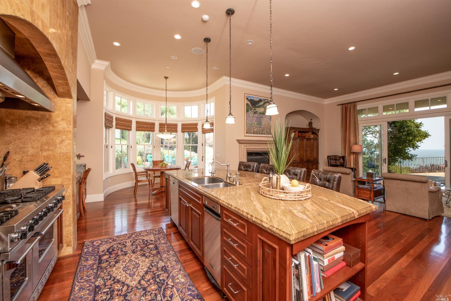 208 Taylor Road Tiburon, CA 94920 - Photo 1 of 1 Complementing the kitch is a beautiful family room enhanced by the enchanting water views. Rich wood floors and crown molding frame this space.