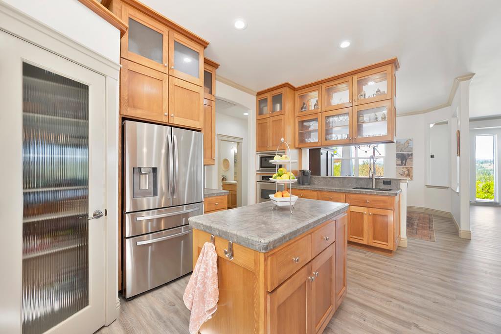 3254 Clark Street Placerville, CA 95667 - Photo 20 of 45 a kitchen with a refrigerator and a sink