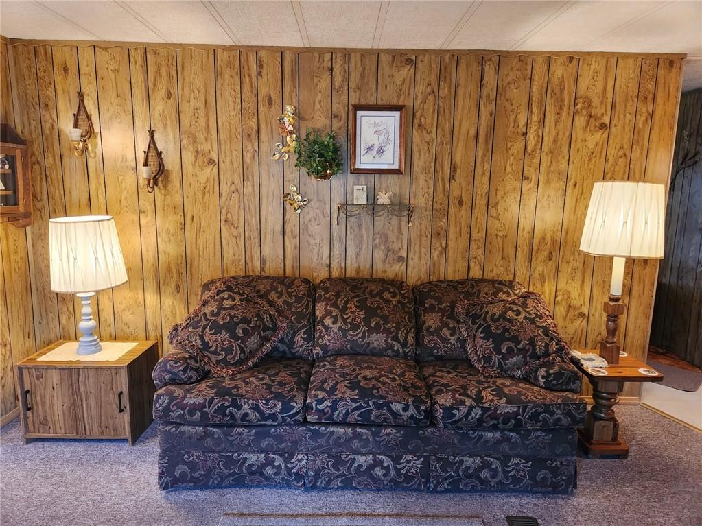 935 Rockdale Road Butler, PA 16002 - Photo 13 of 34 a living room with a couch and a table