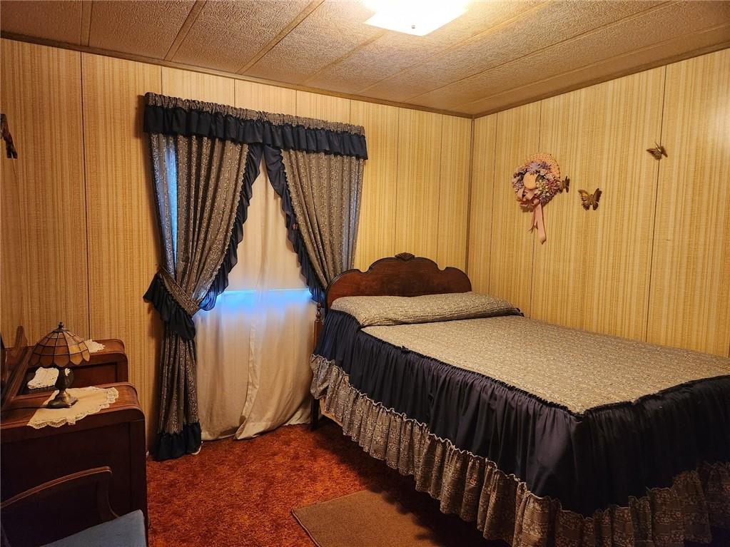 935 Rockdale Road Butler, PA 16002 - Photo 19 of 34 a bedroom with a bed and a window