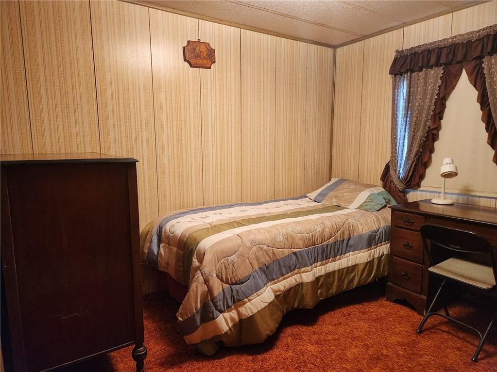 935 Rockdale Road Butler, PA 16002 - Photo 21 of 34 a bedroom with a bed and a window