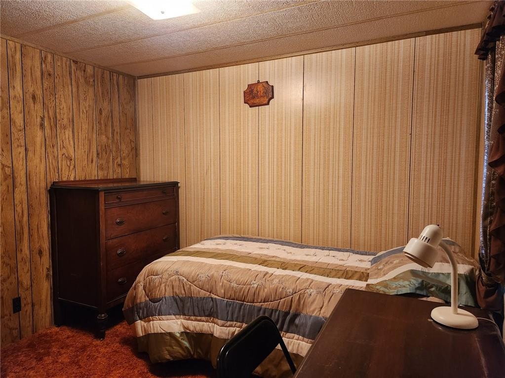 935 Rockdale Road Butler, PA 16002 - Photo 22 of 34 a bedroom with a bed and a window