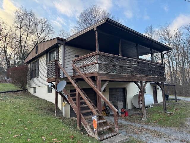 935 Rockdale Road Butler, PA 16002 - Photo 27 of 34 a house with trees in front of it