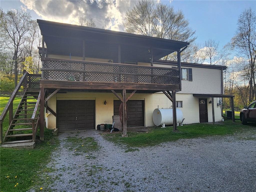 935 Rockdale Road Butler, PA 16002 - Photo 28 of 34 a front view of a house with garden
