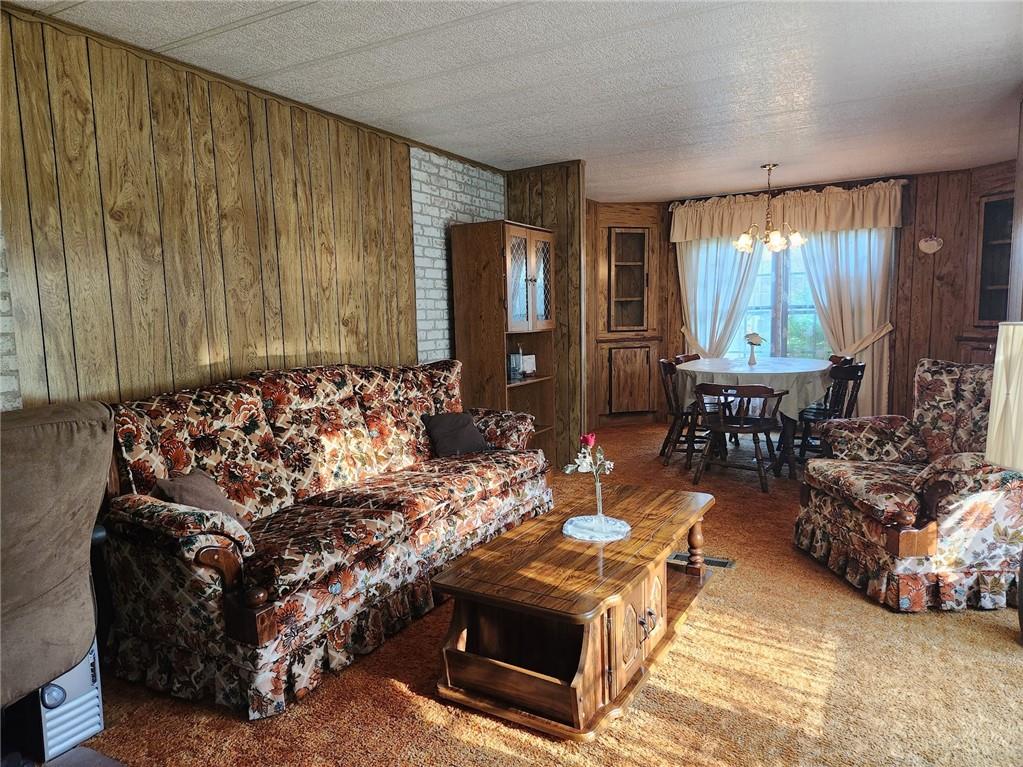935 Rockdale Road Butler, PA 16002 - Photo 6 of 34 a living room with furniture and a large window