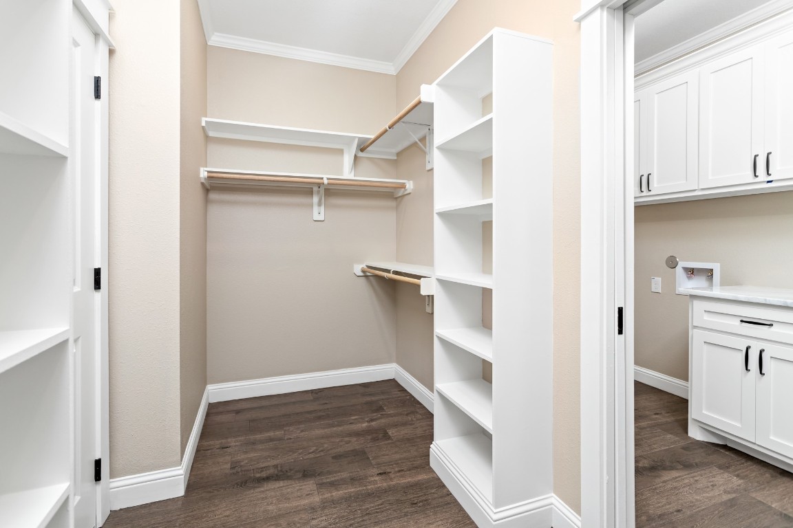 1130 Lyndale Street Vidor, TX 77662 - Photo 32 of 44 a view of walk in closet with empty racks
