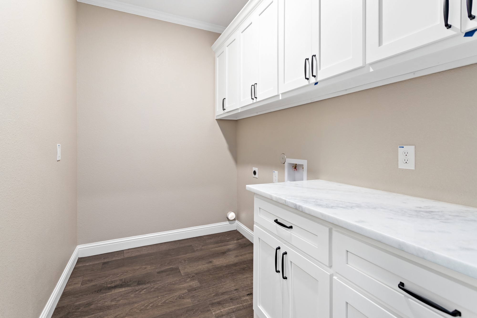 1130 Lyndale Street Vidor, TX 77662 - Photo 34 of 44 a view of cabinets with wooden floor
