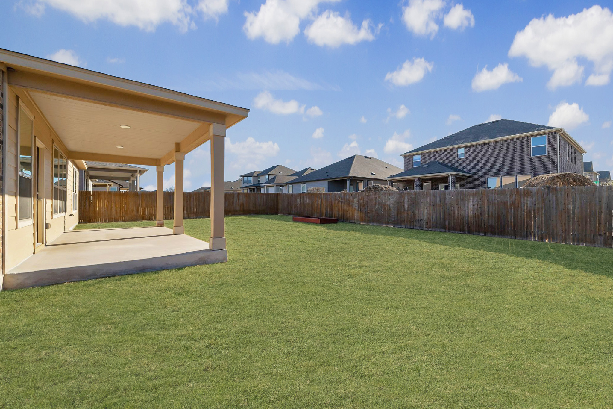 1829 Stringer Pass Leander, TX 78641 - Photo 26 of 36 Fenced backyard featuring a patio and a residential view