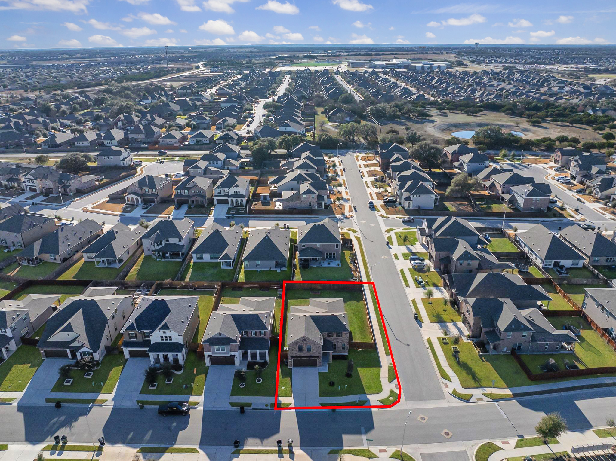 1829 Stringer Pass Leander, TX 78641 - Photo 31 of 36 Aerial view of property's location featuring property boundaries highlighted and nearby suburban area