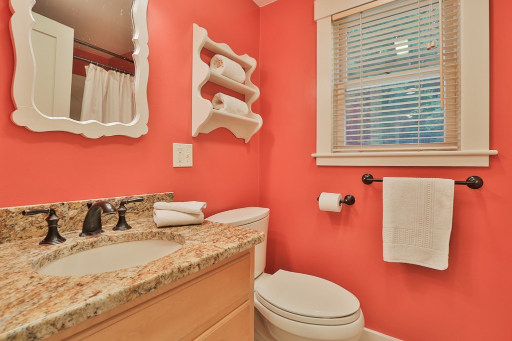 74 River Road Merrimac, MA 01860 - Photo 17 of 29 a bathroom with a granite countertop toilet sink and mirror