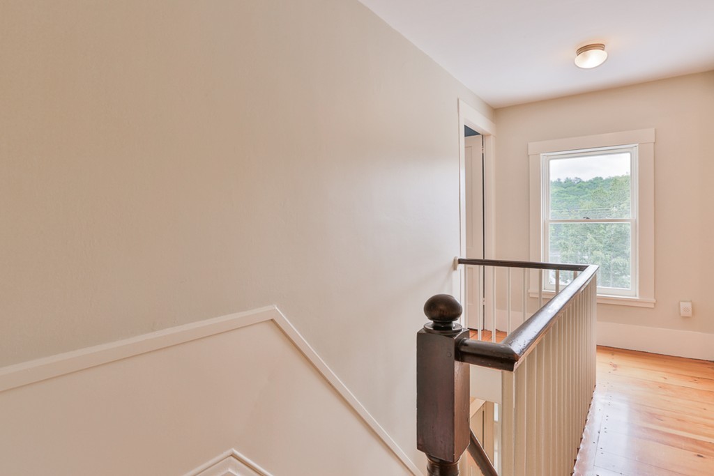74 River Road Merrimac, MA 01860 - Photo 20 of 29 a view of entryway and hall with wooden floor