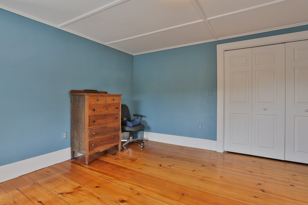 74 River Road Merrimac, MA 01860 - Photo 27 of 29 an empty room with wooden floor and closet