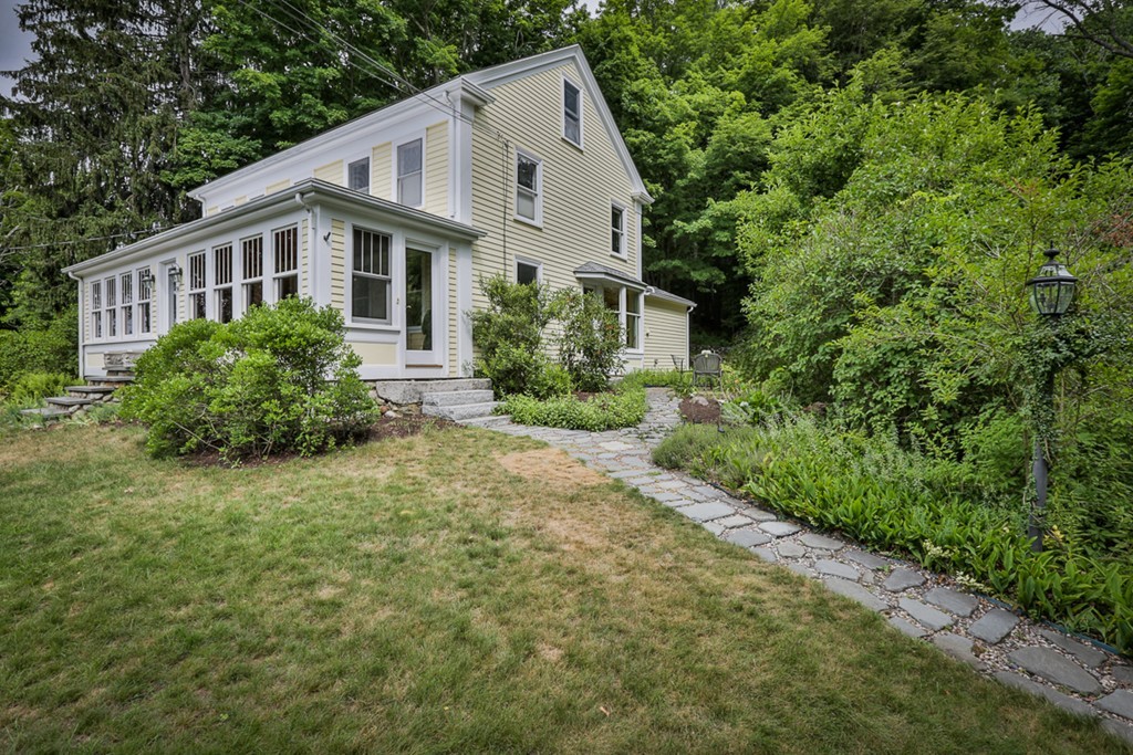 74 River Road Merrimac, MA 01860 - Photo 28 of 29 a view of a house with backyard and garden