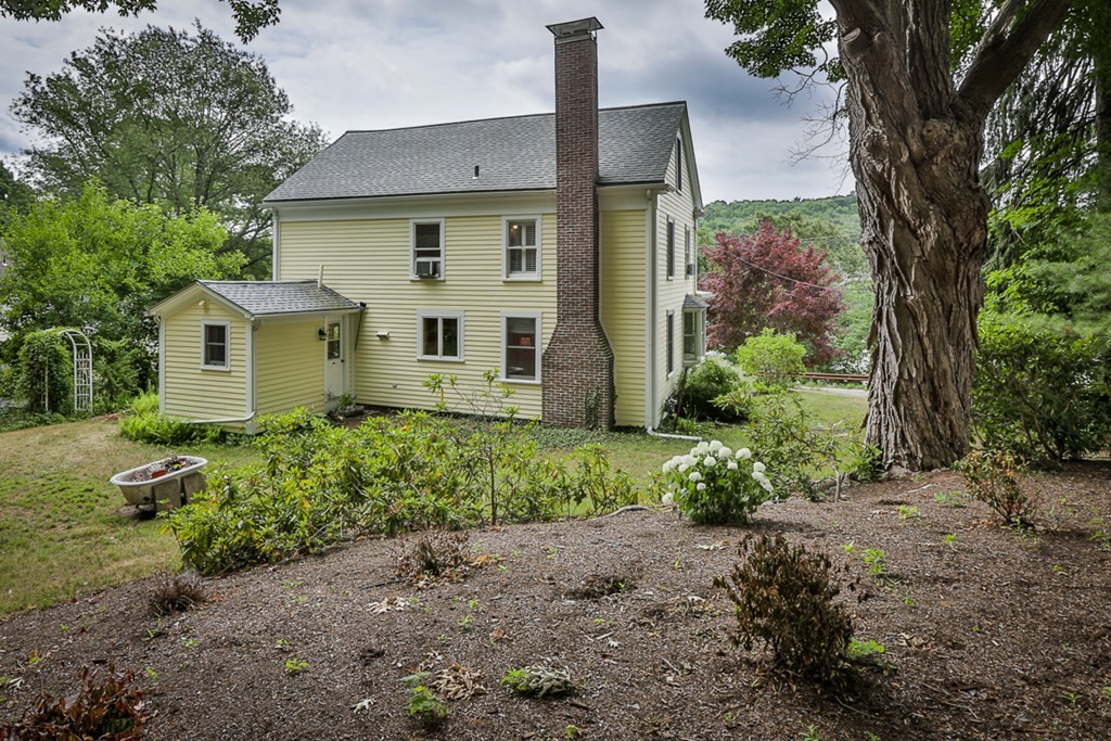 74 River Road Merrimac, MA 01860 - Photo 29 of 29 a view of a house with backyard and garden