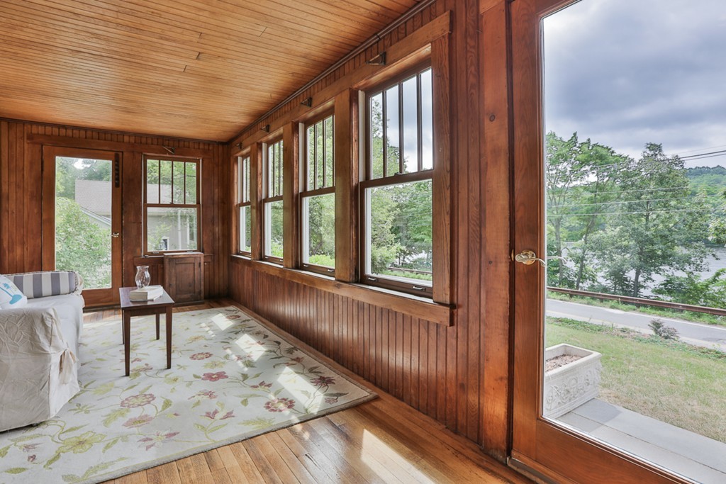 74 River Road Merrimac, MA 01860 - Photo 5 of 29 a living room with hardwood floor and a large window
