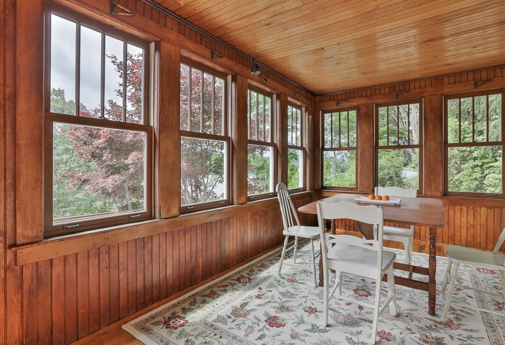74 River Road Merrimac, MA 01860 - Photo 6 of 29 a dining room with furniture a rug and a large window