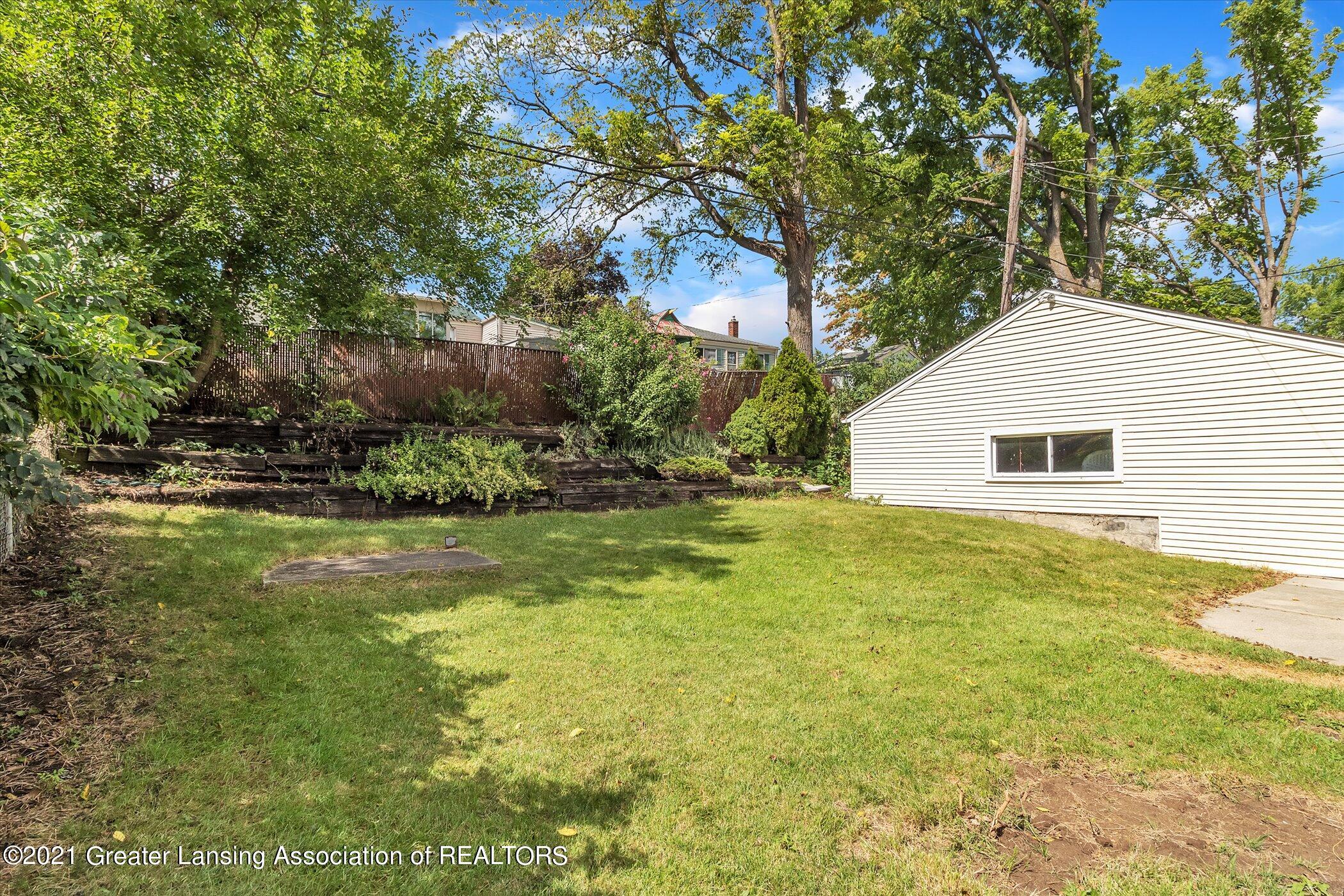 1021 Westfield Road Lansing, MI 48917 - Photo 40 of 42 40-1021-Westfield-Rd-WindowStill-Real-Es