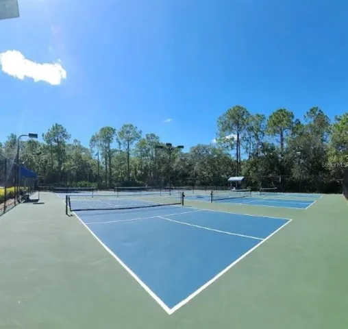 an aerial view of a house with a garden