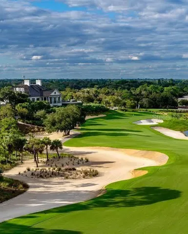 a view of swimming pool with a yard