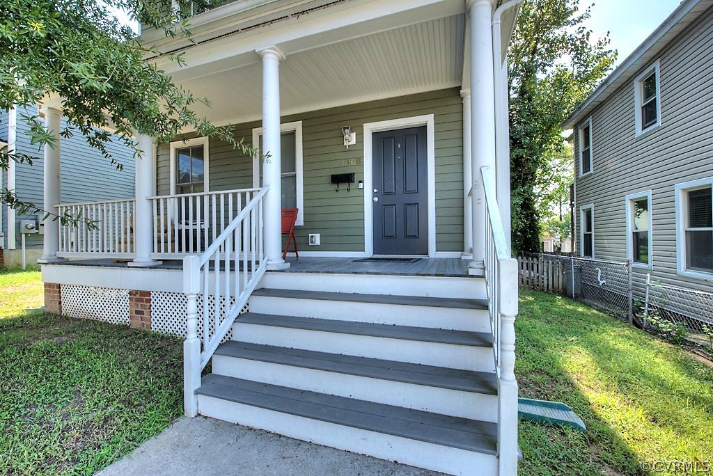 1308 Decatur Street Richmond, VA 23224 - Photo 3 of 30 a front view of a house with a yard