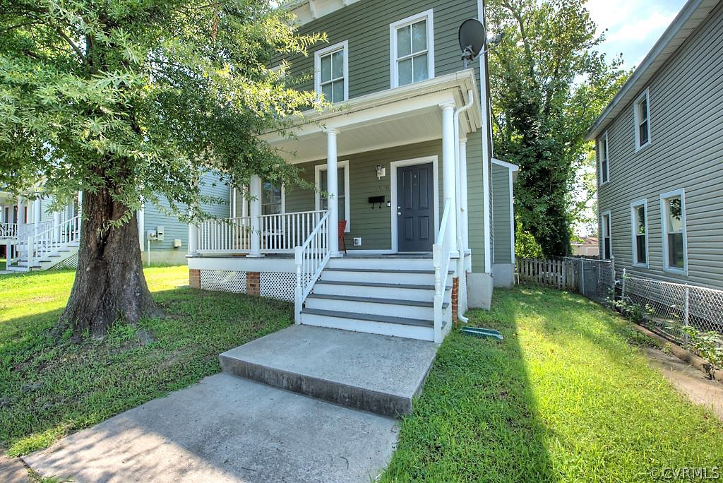 1308 Decatur Street Richmond, VA 23224 - Photo 6 of 30 a view of a house with a backyard