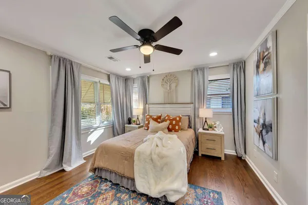 a bed room with a bed and a window