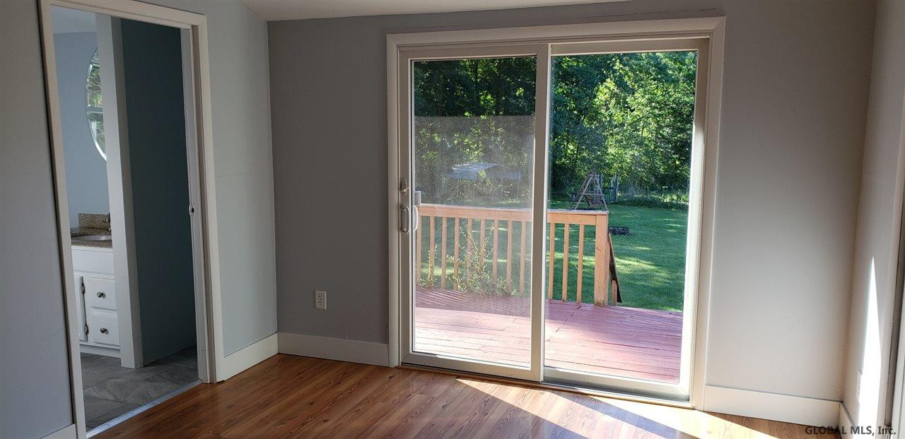 1040 Raymond Road Malta, NY 12020 - Photo 19 of 67 with outside access to gorgeous grounds!