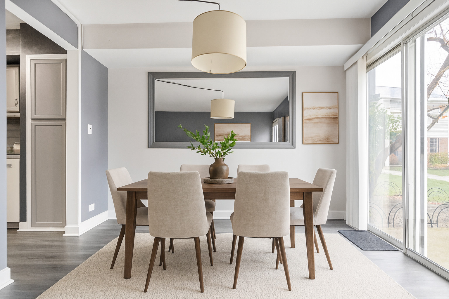 1941 Quaker Hollow Lane, Unit 1941 Streamwood, IL 60107 - Photo 3 of 13 a view of a dining room with furniture and a window