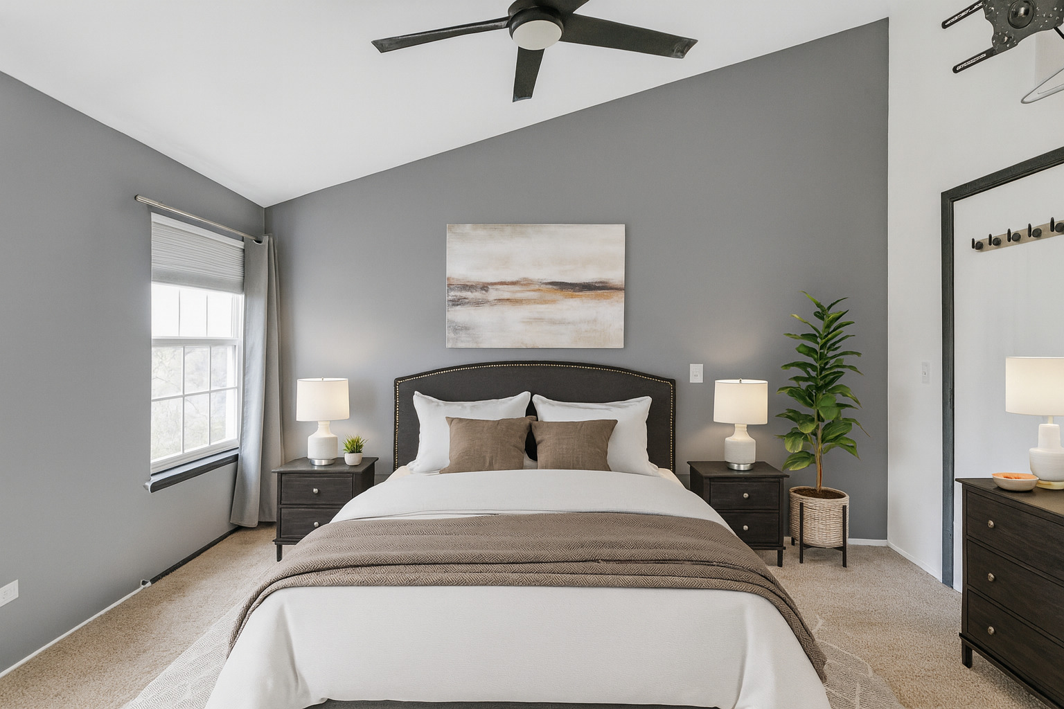 1941 Quaker Hollow Lane, Unit 1941 Streamwood, IL 60107 - Photo 4 of 13 a bedroom with a large bed and a tv