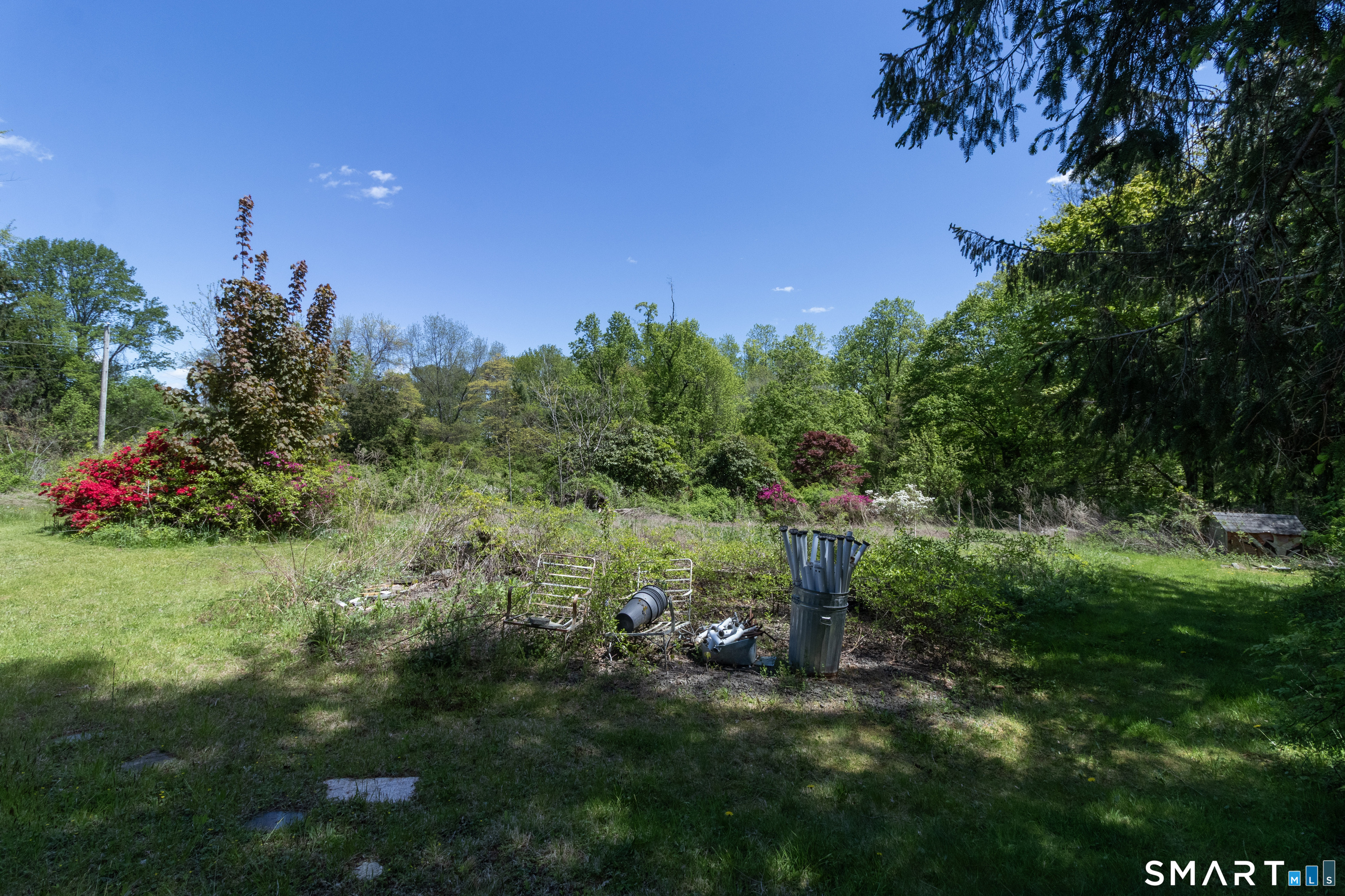 1973 Long Hill Road Guilford, CT 06437 - Photo 11 of 19 a view of a garden with a tree