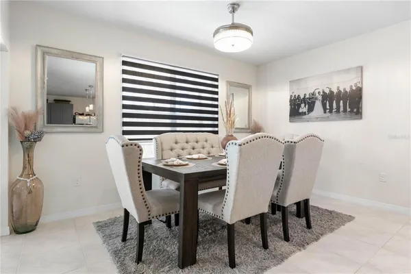 a view of a dining room with furniture
