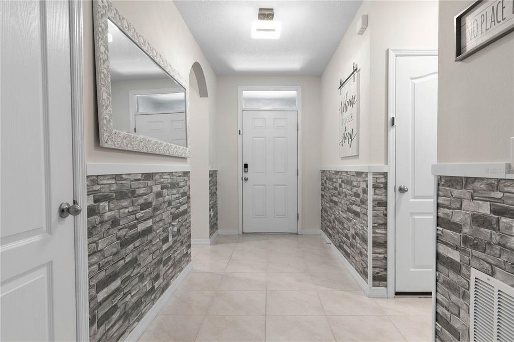 225 Sunset Point Drive Ormond Beach, FL 32174 - Photo 4 of 53 a bathroom with a shower