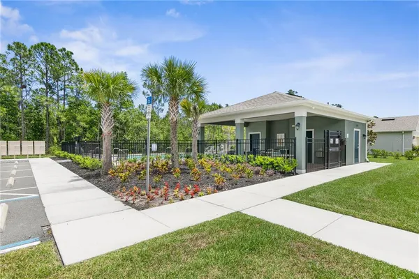a view of a house with a swimming pool