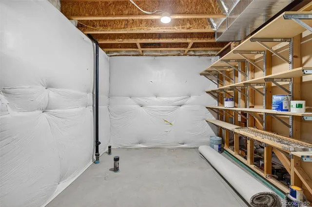 a view of a backyard with large trees