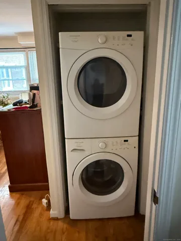 a view of a hallway with washer and dryer