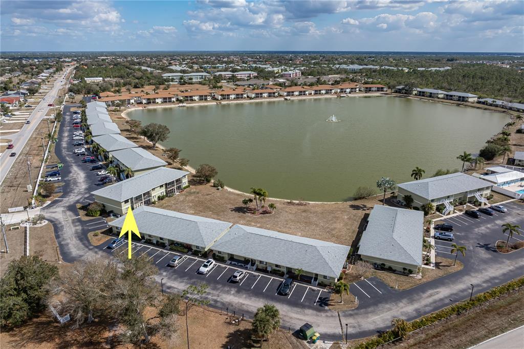 25225 Rampart Boulevard, Unit 1606 Punta Gorda, FL 33983 - Photo 12 of 34 an aerial view of a house with a lake view