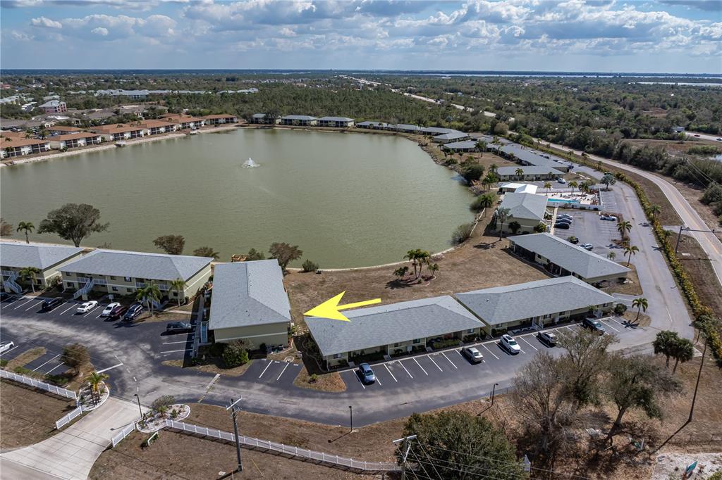 25225 Rampart Boulevard, Unit 1606 Punta Gorda, FL 33983 - Photo 2 of 34 an aerial view of a house with a lake view