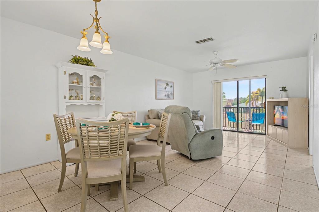 25225 Rampart Boulevard, Unit 1606 Punta Gorda, FL 33983 - Photo 21 of 34 a living room with furniture and a window