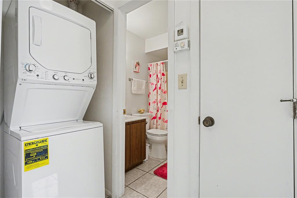 25225 Rampart Boulevard, Unit 1606 Punta Gorda, FL 33983 - Photo 31 of 34 a utility room with dryer and washer