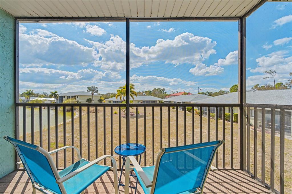 25225 Rampart Boulevard, Unit 1606 Punta Gorda, FL 33983 - Photo 33 of 34 a view of a balcony with chair