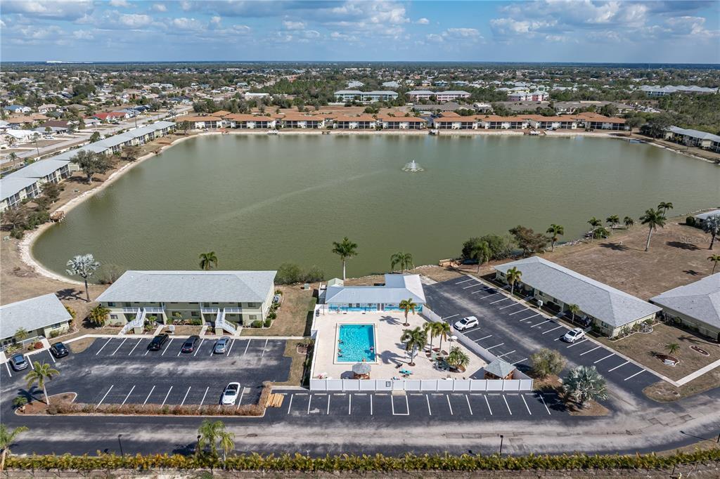 25225 Rampart Boulevard, Unit 1606 Punta Gorda, FL 33983 - Photo 34 of 34 an aerial view of a house with a lake view