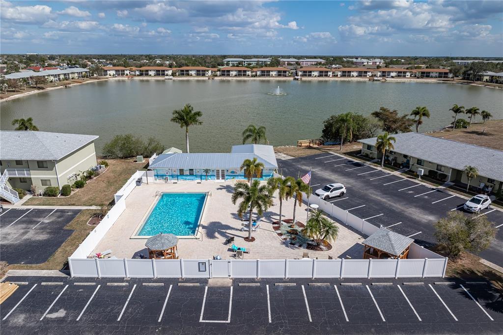 25225 Rampart Boulevard, Unit 1606 Punta Gorda, FL 33983 - Photo 9 of 34 swimming pool view with a lake view