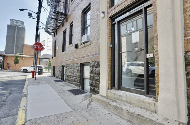 a view of a building with a street