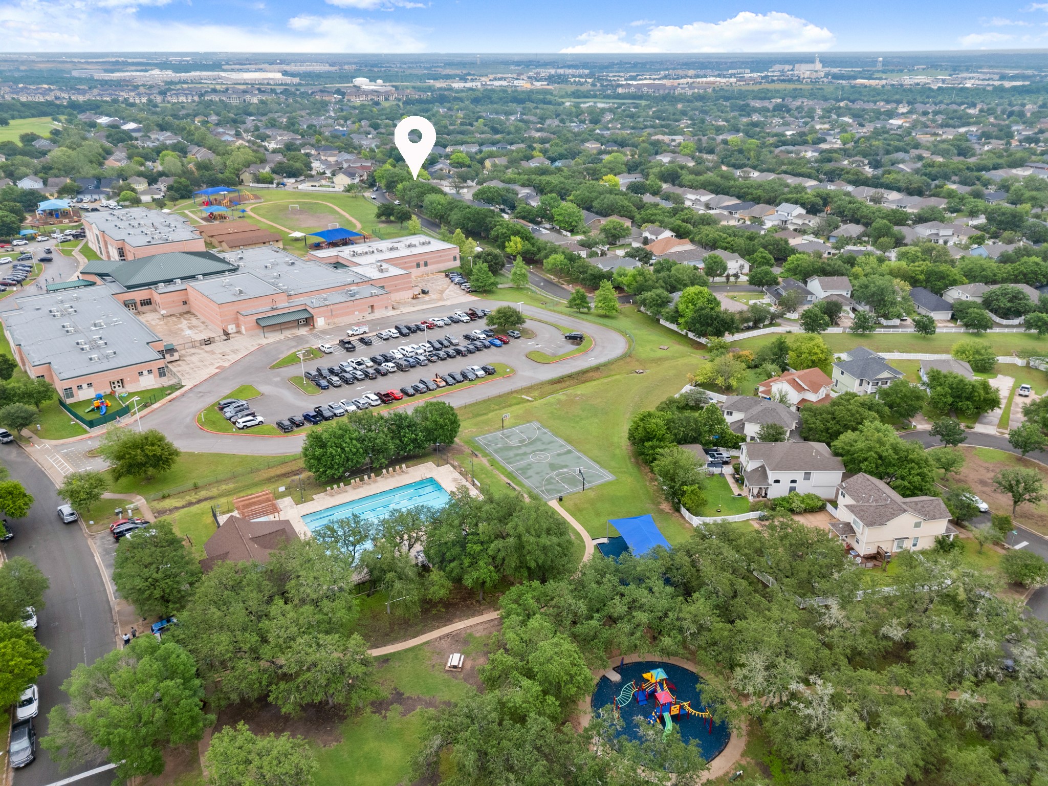 360 Sampson Kyle, TX 78640 - Photo 34 of 36 Aerial perspective showcasing the surrounding neighborhood, recreational amenities, and an educational institution