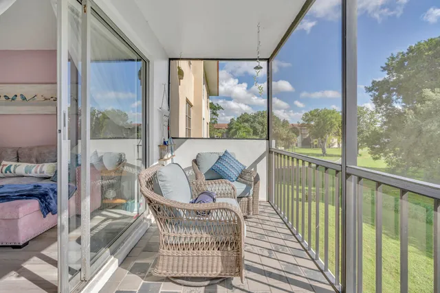 a view of a balcony with chair
