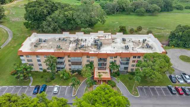 an aerial view of a house with a garden