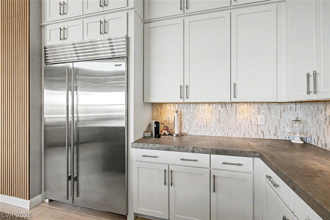 6014 Willow Ridge Court Las Vegas, NV 89135 - Photo 36 of 99 This contemporary kitchen offers sleek stainless steel appliances and ample cabinetry.