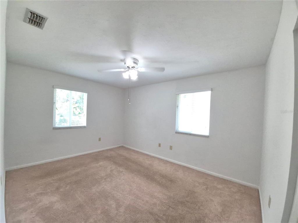 25632 Southwest 19 Avenue Newberry, FL 32669 - Photo 14 of 20 an empty room with a window